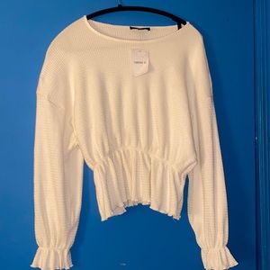 Forever 21. Cream color top. Lots of stretch!! Medium